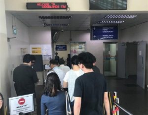 KTM Staff Scan Passengers Train Tickets From Singapore To JB 